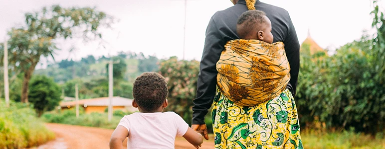Mother and children walking