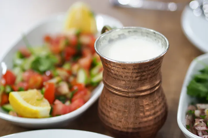 A brass cup of Ayran